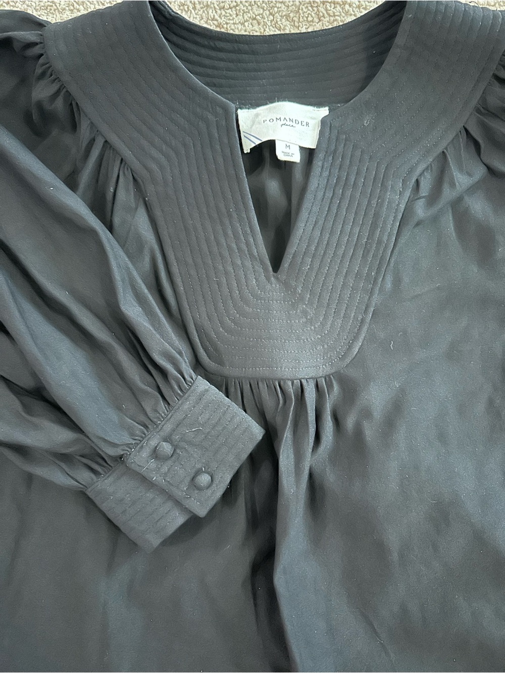 Pomander Place Black Structured Blouse from Tuckernuck